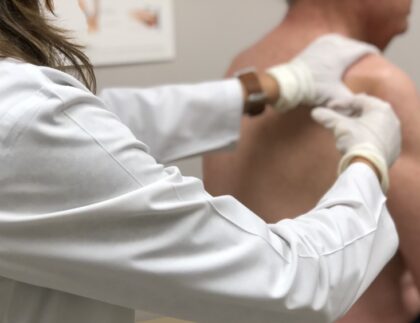 at the doctor s man getting a steroid injection in shoulder for torn rotator cuff nominated t20 R6OP2a e1683712896273